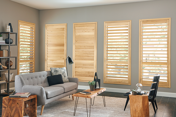 Light wood shutters from Blinds by Design brighten work space