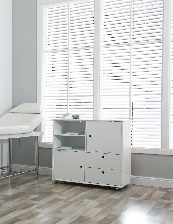 White blinds in modern treatment center from Blinds by Design