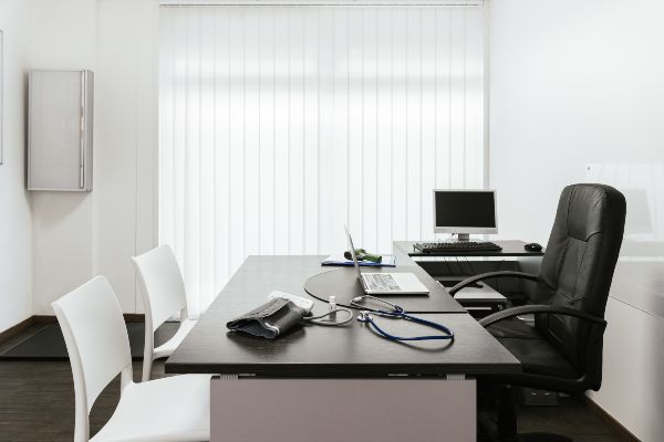 Scottsdale AZ and Boerne TX office with white blinds letting in natural light